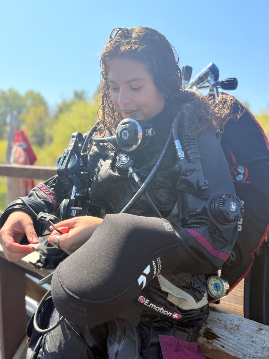 Bailey on the dock prepping a rebreather